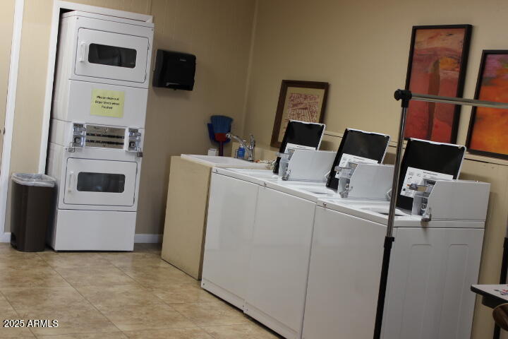 11425 East University Drive, Unit 63 Apache Junction, AZ 85120 - Photo 25 of 30 a room with storage and utility