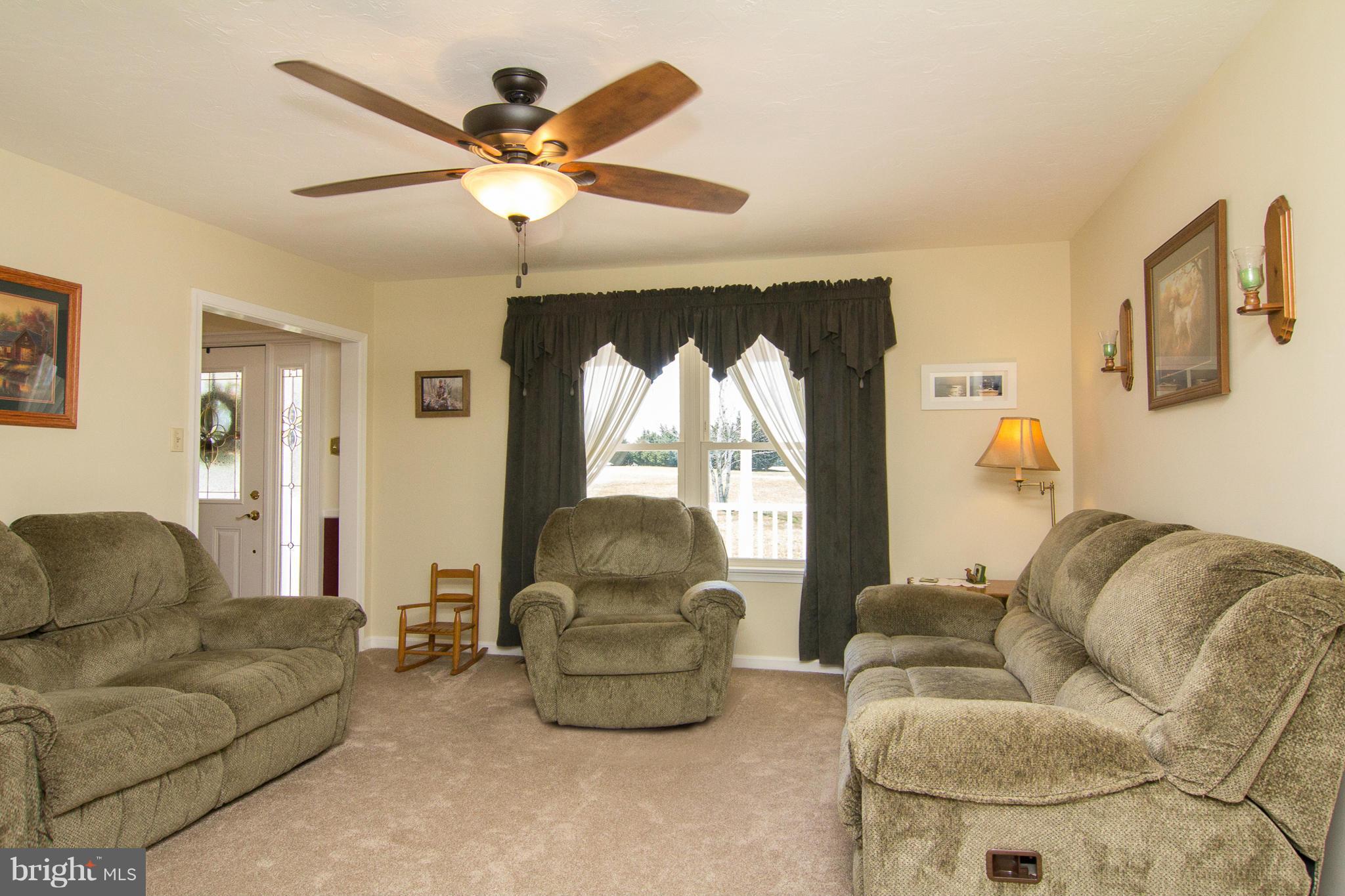 3773 Baptist Road Taneytown, MD 21787 - Photo 12 of 30 a living room with furniture and a large window