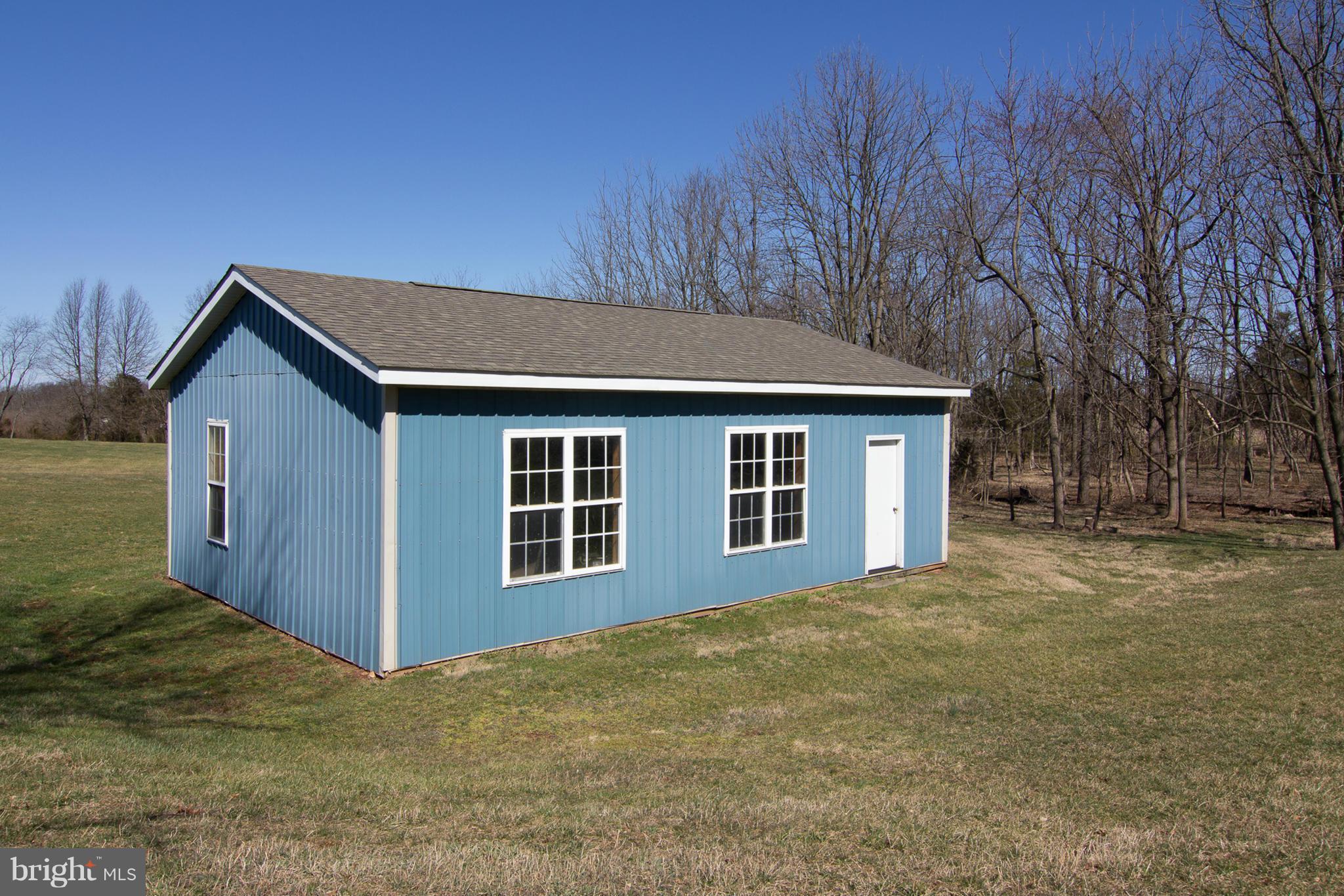 3773 Baptist Road Taneytown, MD 21787 - Photo 30 of 30 a front view of a house with a garden