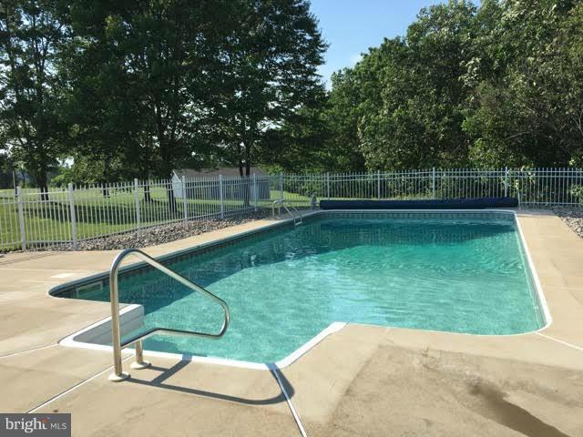 3773 Baptist Road Taneytown, MD 21787 - Photo 4 of 30 a view of a backyard with swimming pool