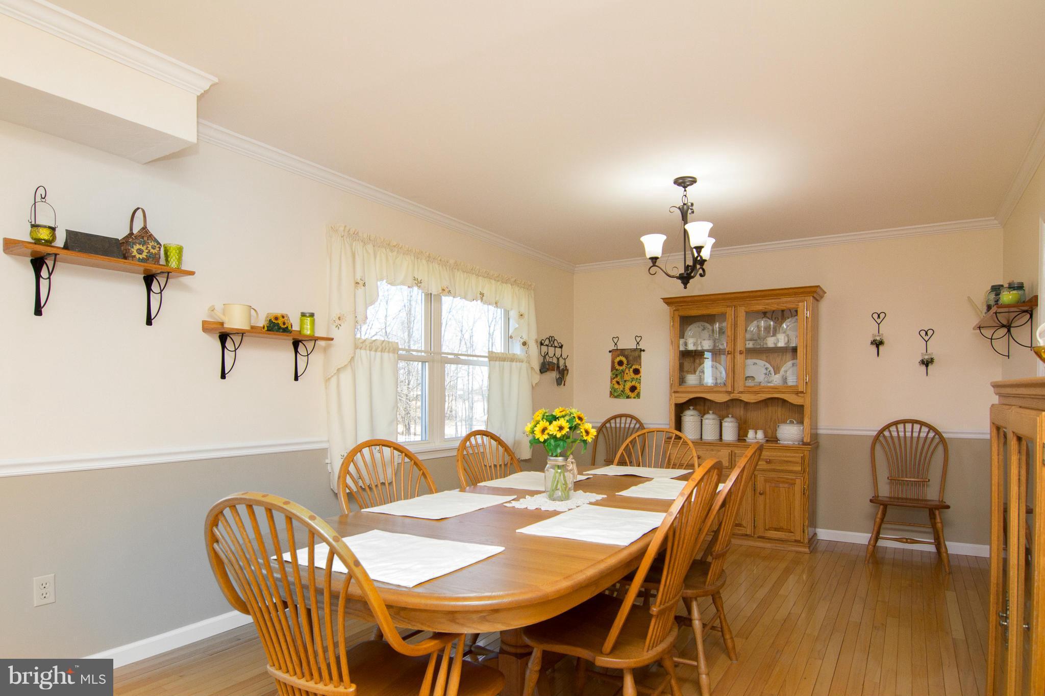 3773 Baptist Road Taneytown, MD 21787 - Photo 7 of 30 a view of a dining room with furniture and window