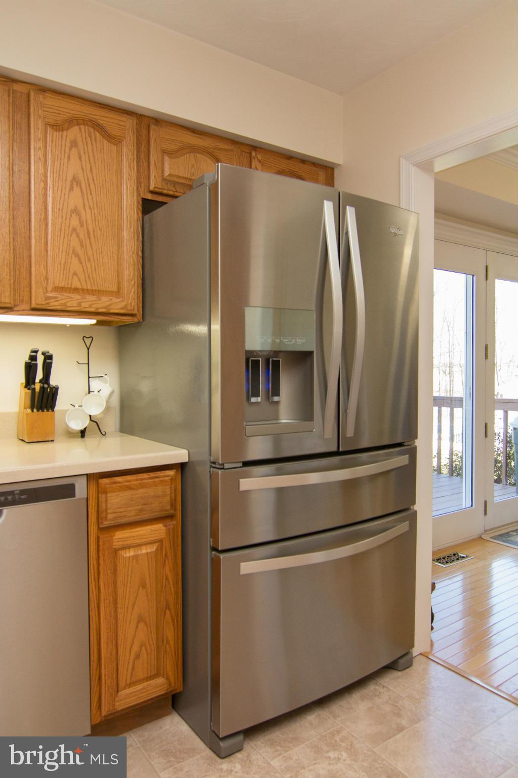 3773 Baptist Road Taneytown, MD 21787 - Photo 8 of 30 a kitchen with stainless steel appliances granite countertop a refrigerator a microwave and cabinets
