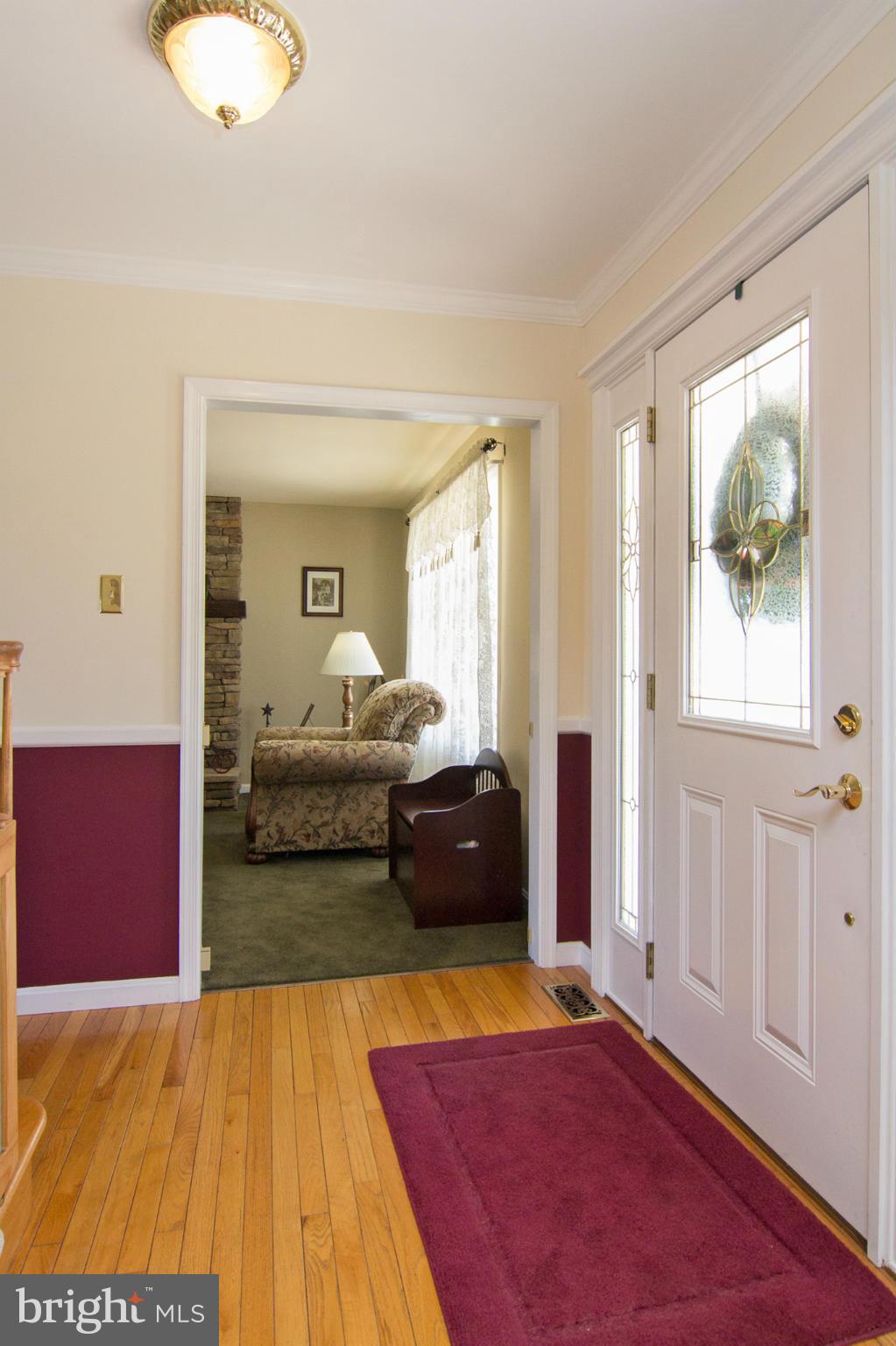 3773 Baptist Road Taneytown, MD 21787 - Photo 10 of 30 a living room with furniture and a rug