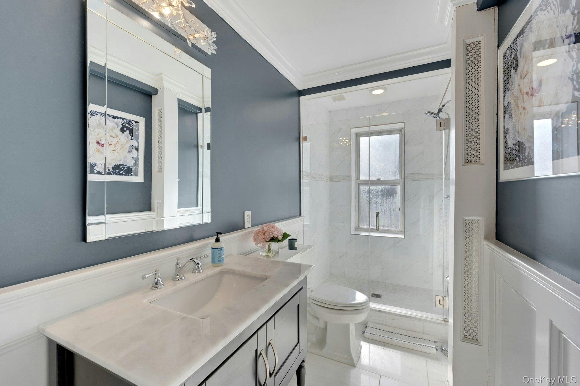 280 Bronxville Road, Unit 3W Bronxville, NY 10708 - Photo 15 of 19 a bathroom with a sink vanity and a mirror
