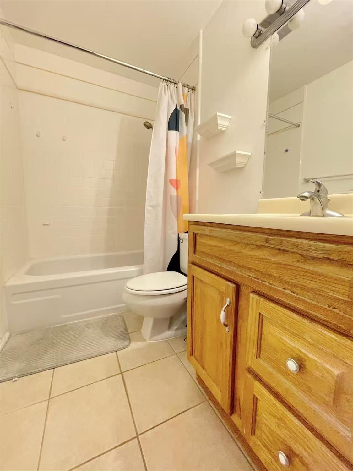 4016 Knoll Top Court Carmichael, CA 95608 - Photo 20 of 33 a bathroom with a sink a toilet and shower