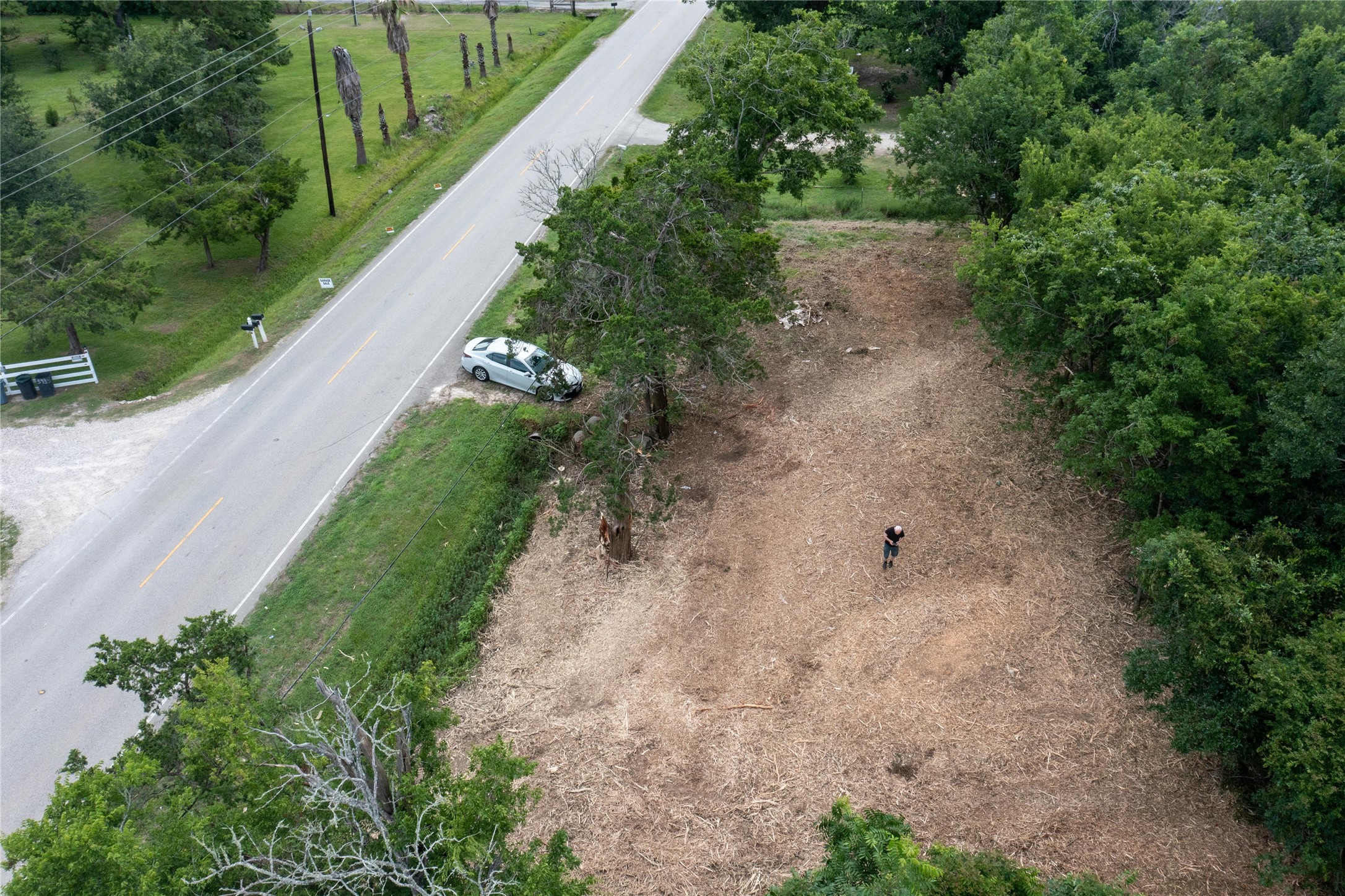 3902 West Cedar Bayou Lynchburg Road Baytown, TX 77521 - Photo 2 of 17 a view of a pathway with a yard