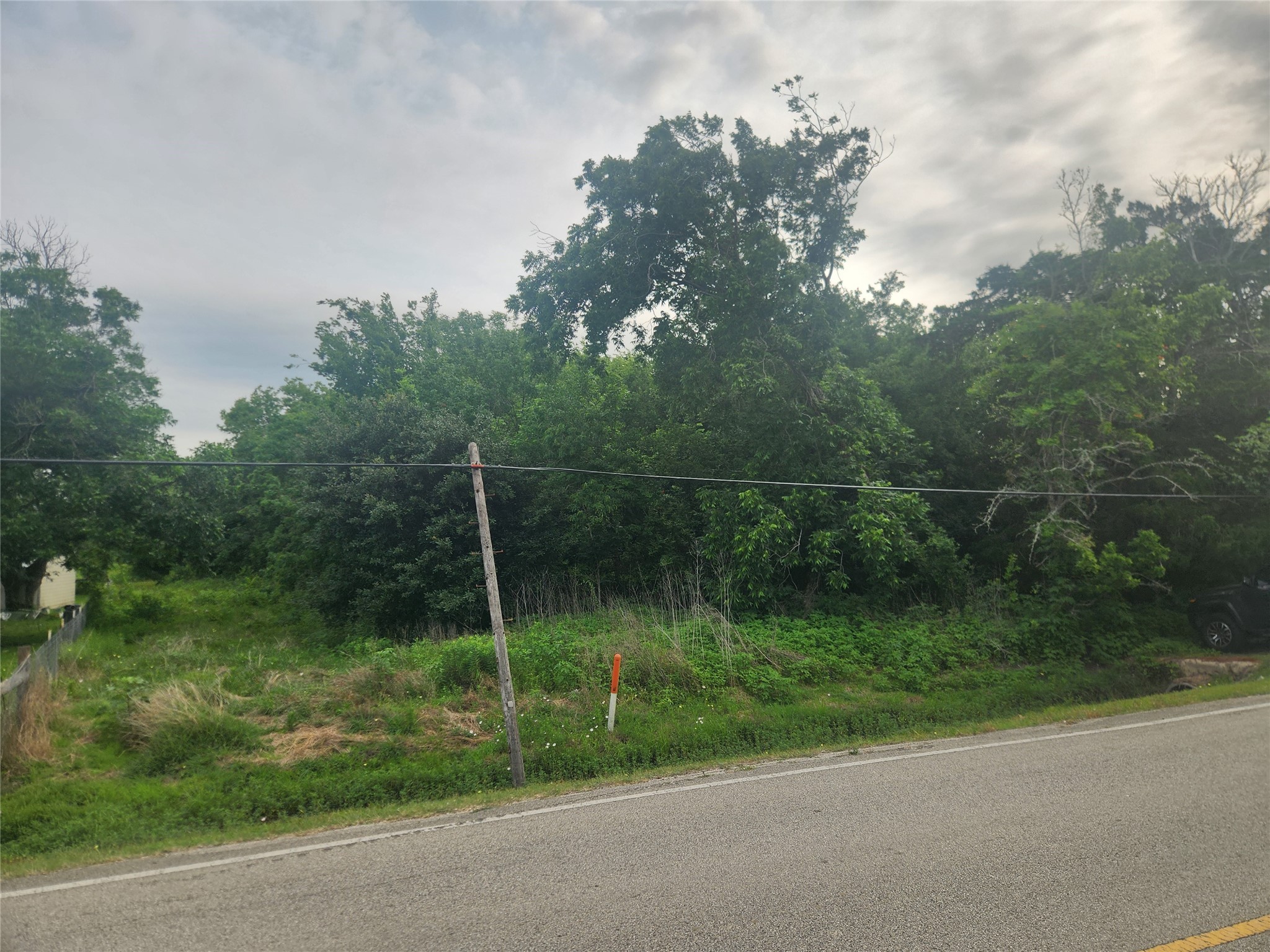 3902 West Cedar Bayou Lynchburg Road Baytown, TX 77521 - Photo 8 of 17 a view of a fence