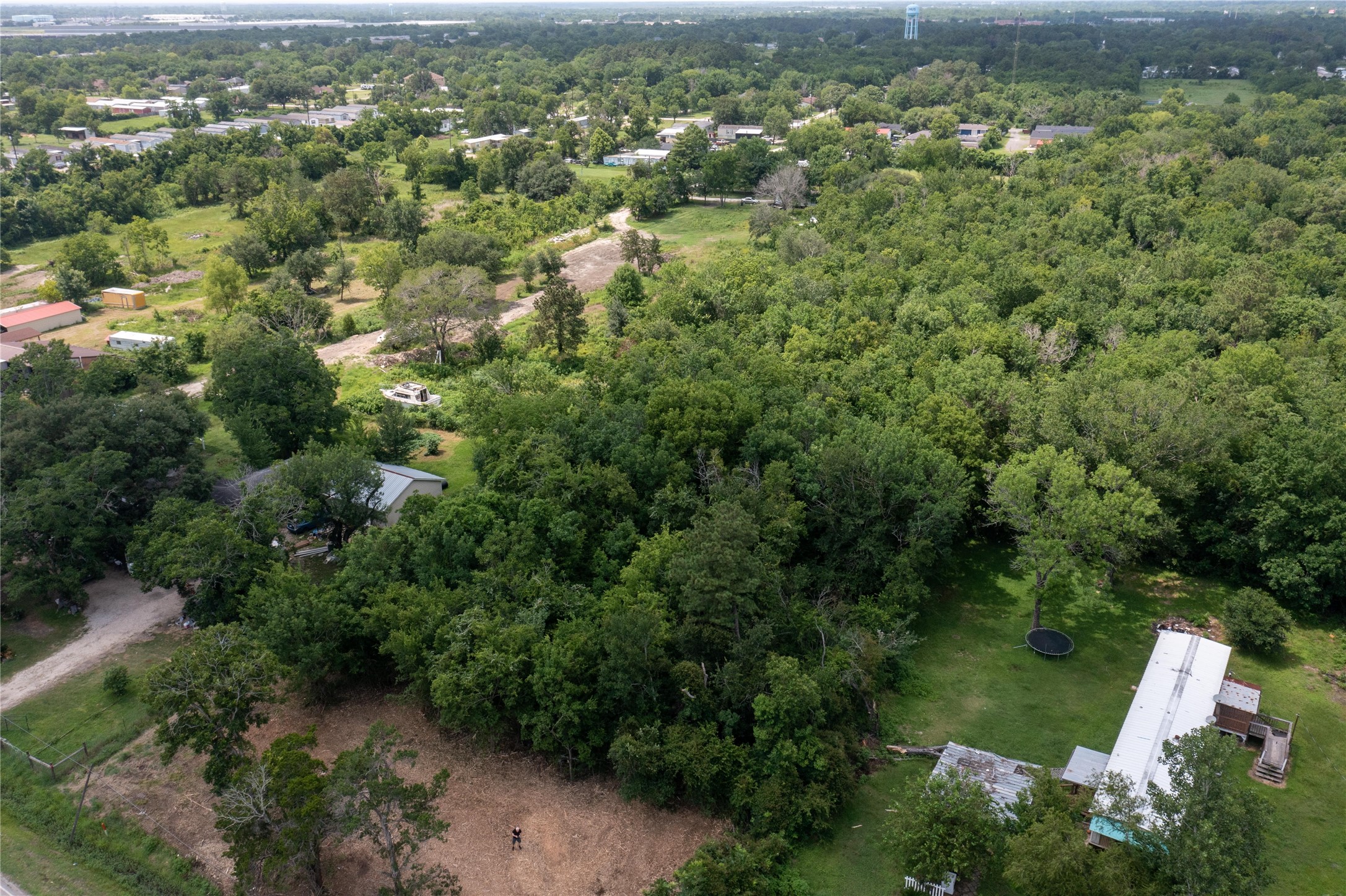 3902 West Cedar Bayou Lynchburg Road Baytown, TX 77521 - Photo 10 of 17 an aerial view of a city with lots of residential buildings