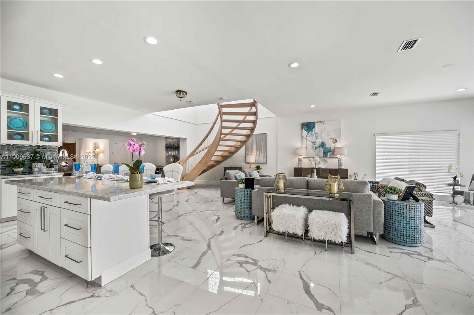 1700 Cleveland Road Miami Beach, FL 33141 - Photo 23 of 60 a living room with furniture and white walls