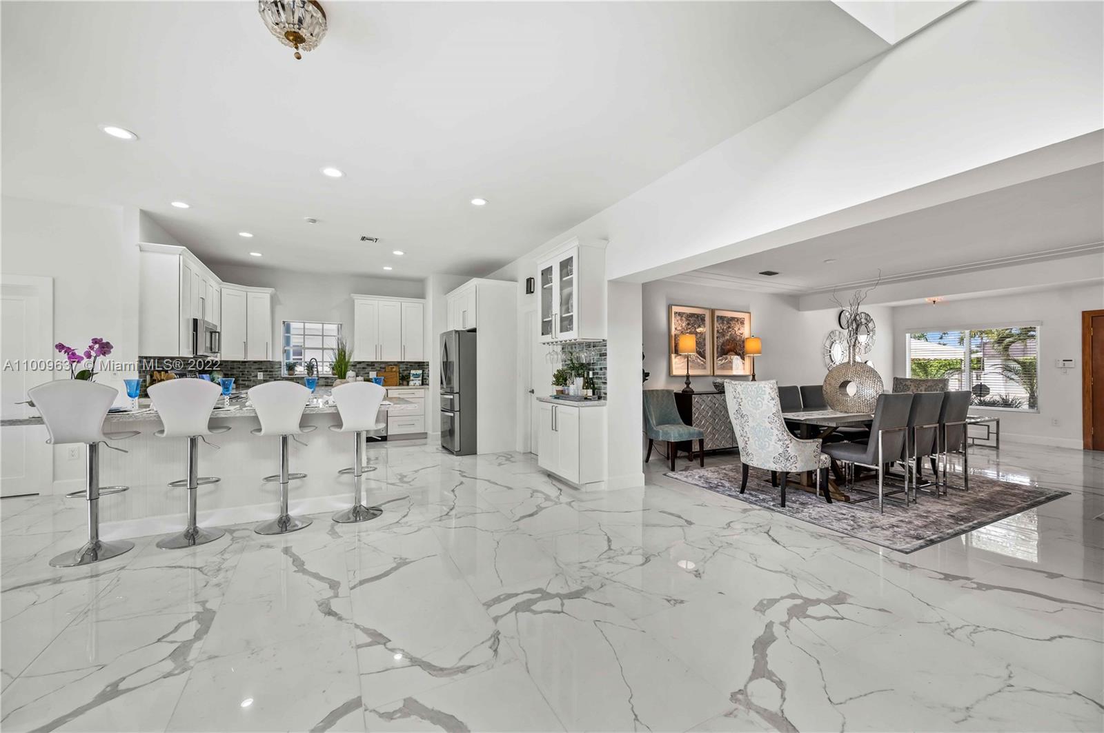 1700 Cleveland Road Miami Beach, FL 33141 - Photo 25 of 60 a view of a living room and dining room