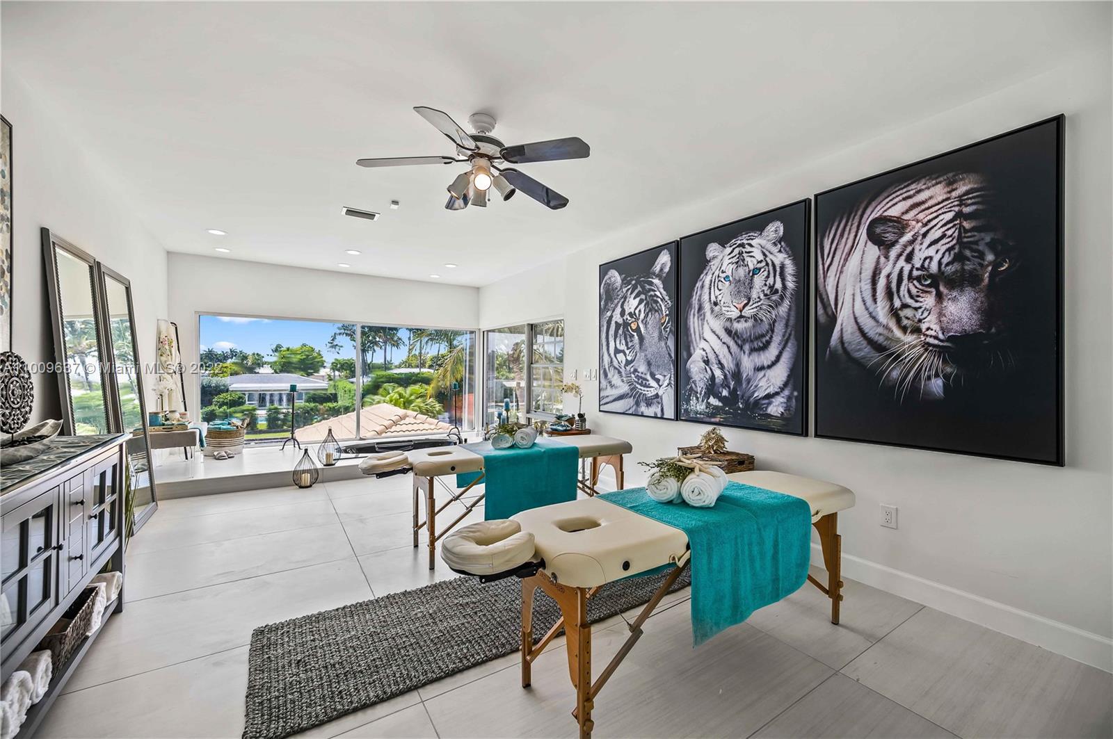 1700 Cleveland Road Miami Beach, FL 33141 - Photo 36 of 60 a living room with furniture and a flat screen tv