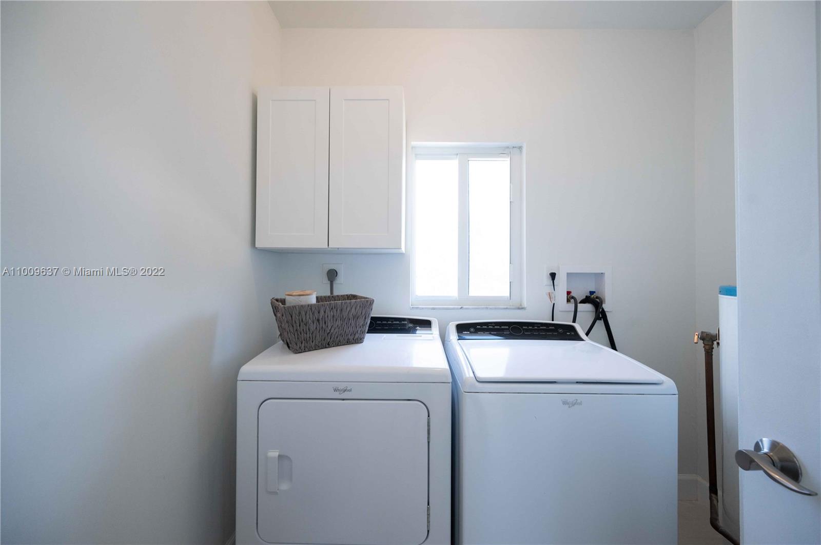 1700 Cleveland Road Miami Beach, FL 33141 - Photo 48 of 60 a view of storage and utility room with washer and dryer