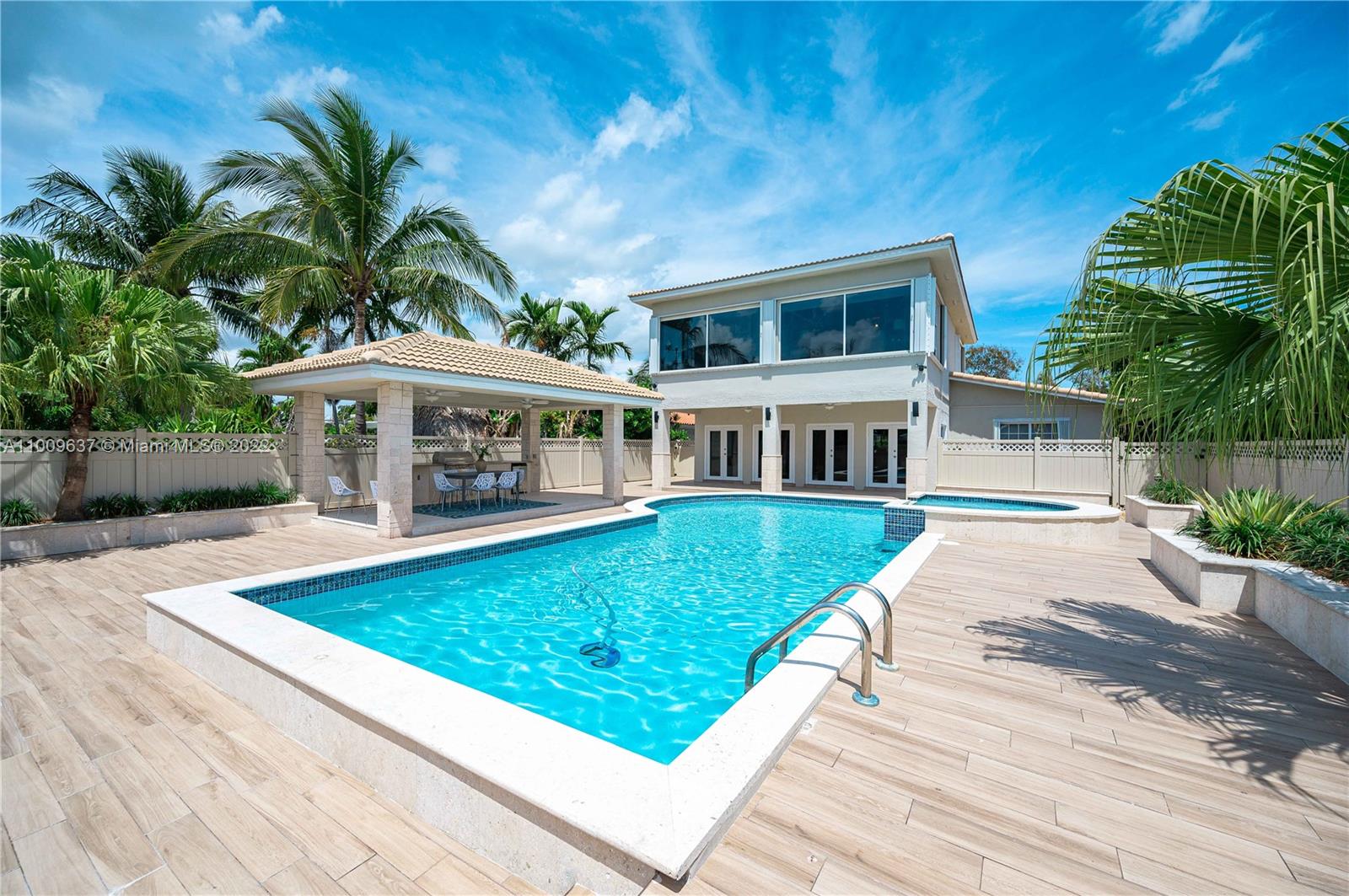 1700 Cleveland Road Miami Beach, FL 33141 - Photo 50 of 60 a view of house with swimming pool outdoor seating