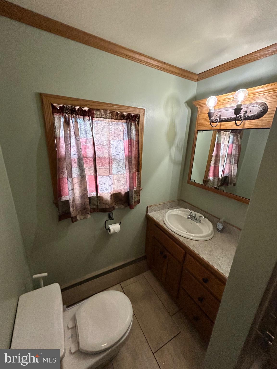 56 Maclay Street Milroy, PA 17063 - Photo 15 of 36 Charming bathroom with natural light.