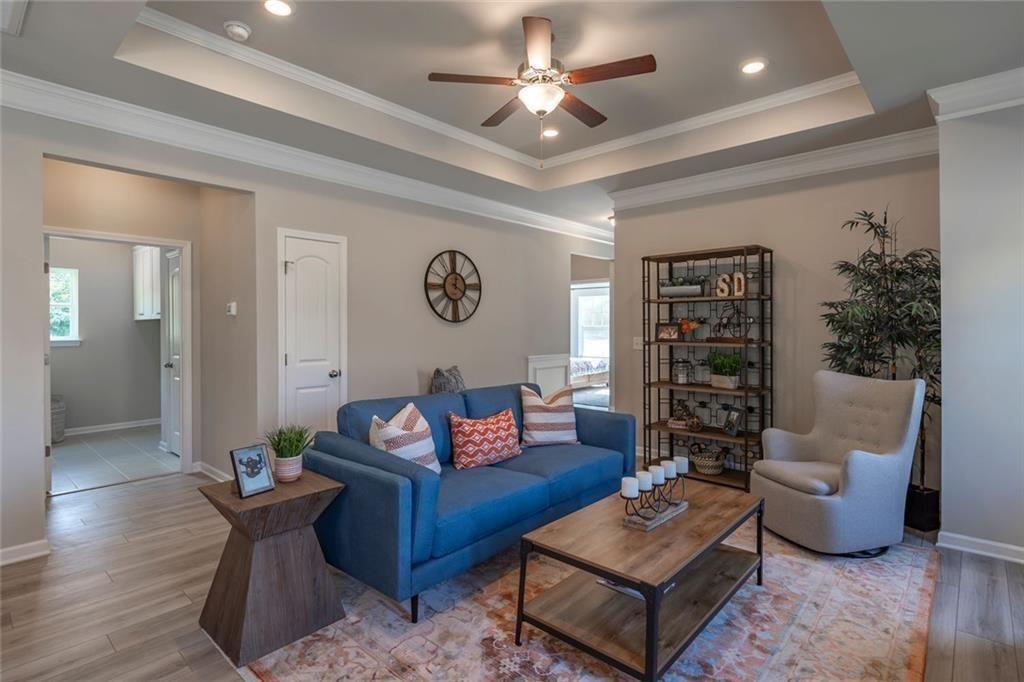 157 Red Oak Lane Calhoun, GA 30701 - Photo 3 of 18 a living room with furniture and wooden floor