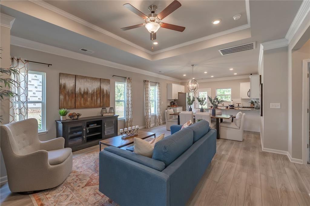 157 Red Oak Lane Calhoun, GA 30701 - Photo 5 of 18 a living room with furniture and a flat screen tv