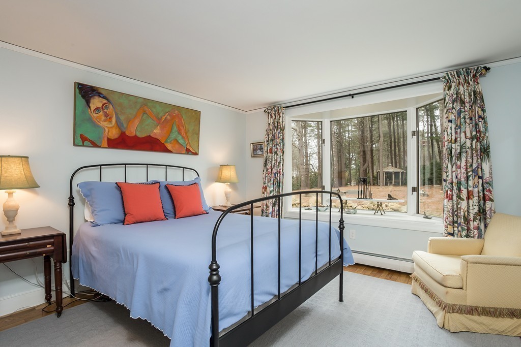 10 Holly Road Marion, MA 02738 - Photo 11 of 29 a bedroom with a bed and a large window