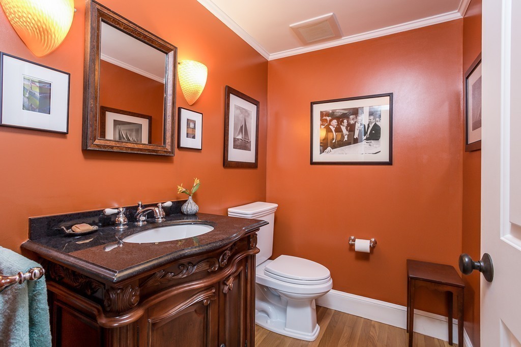 10 Holly Road Marion, MA 02738 - Photo 14 of 29 a bathroom with a sink a toilet and mirror