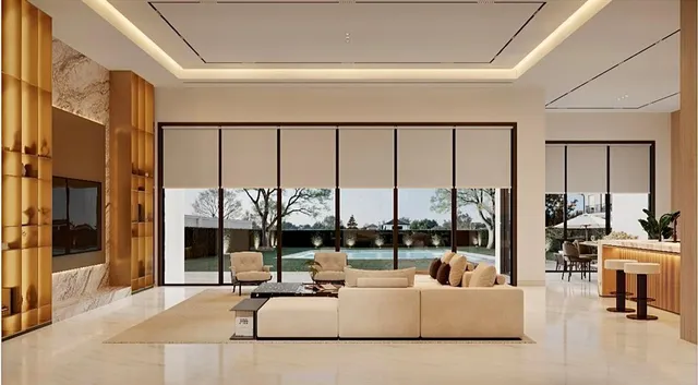 a living room with a large window and a table