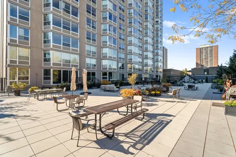a view of a patio with couches and chairs