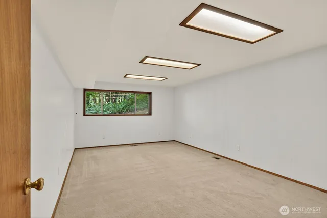 an empty room with windows