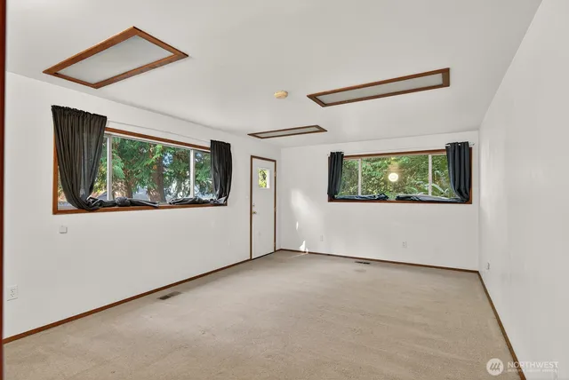 an empty room with windows