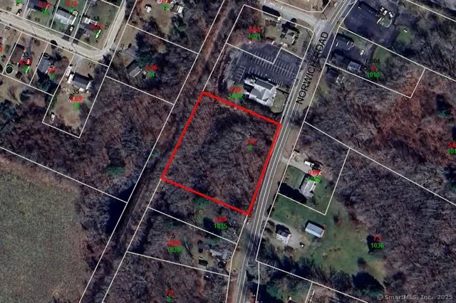 a view of a backyard with green space