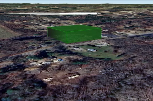 a view of a backyard with green space