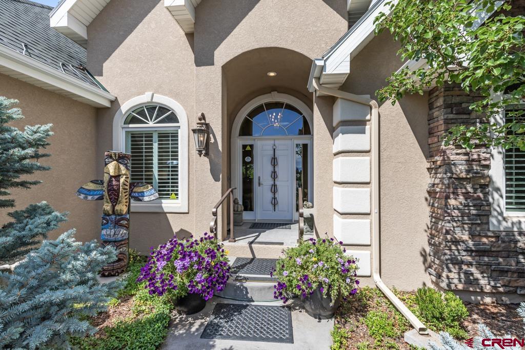 15103 6260th Road Montrose, CO 81403 - Photo 45 of 45 a front view of a house with a yard
