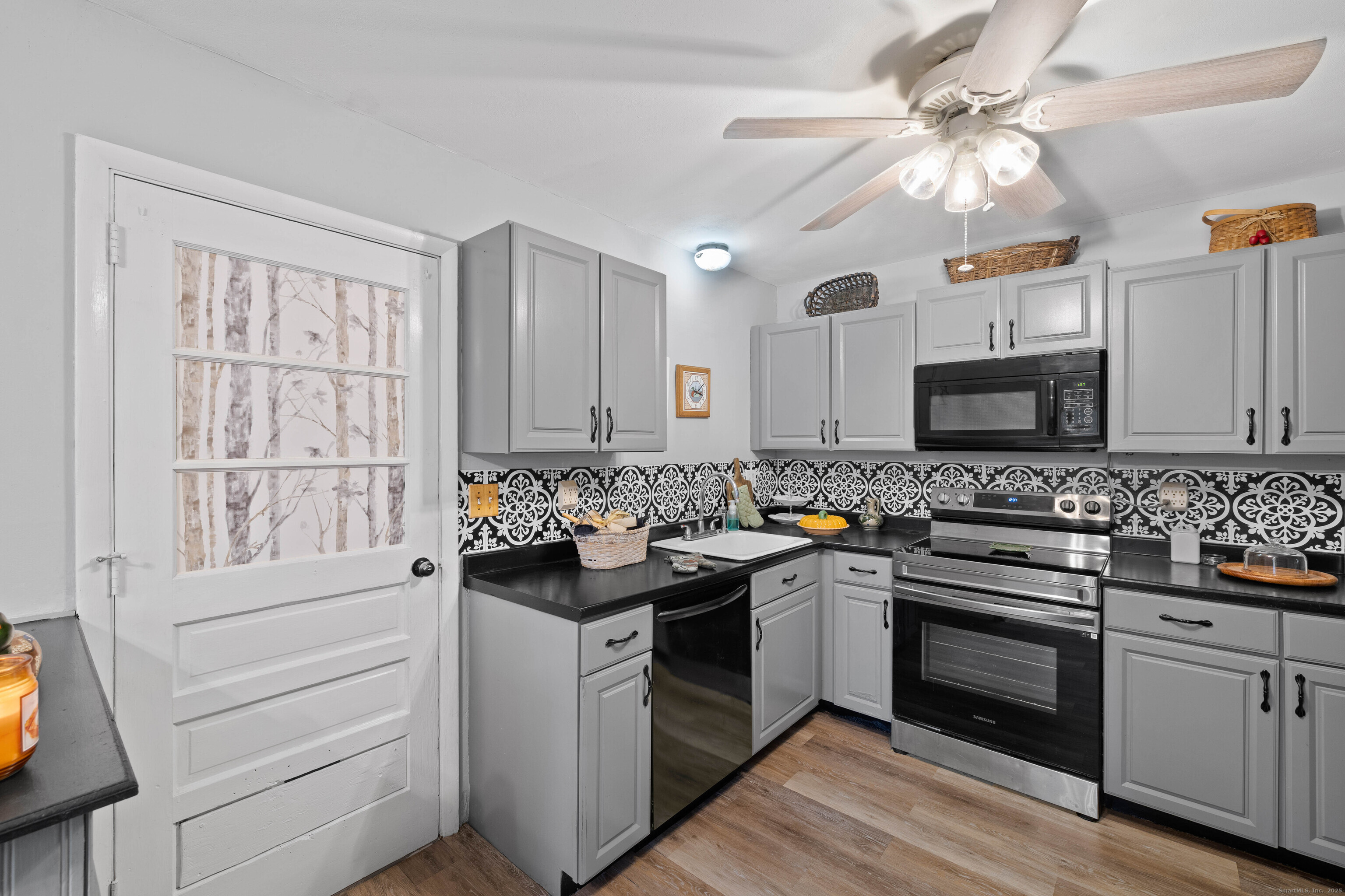 15 Egypt Lane Clinton, CT 06413 - Photo 11 of 40 a kitchen with a stove oven and sink