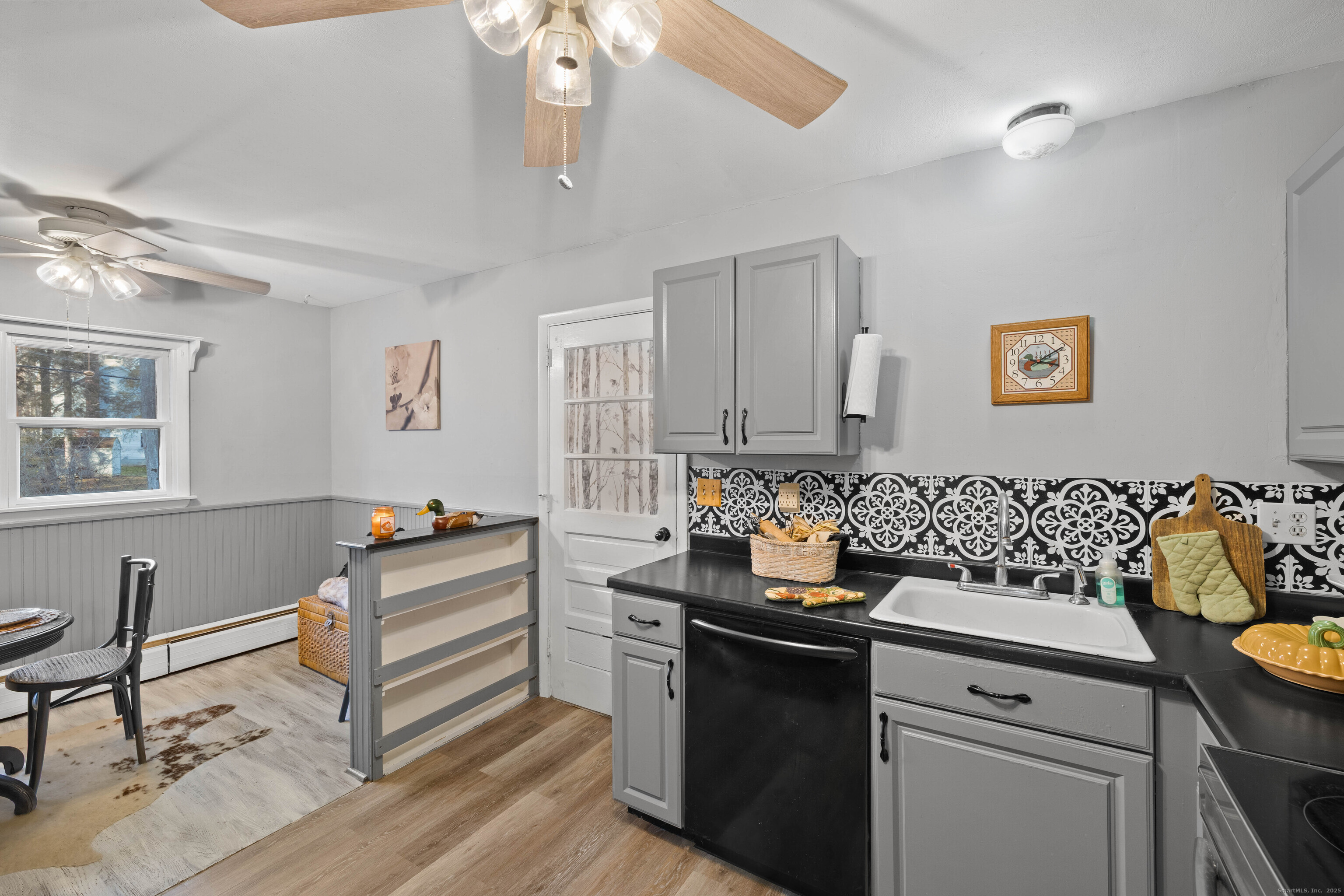 15 Egypt Lane Clinton, CT 06413 - Photo 12 of 40 a kitchen with a sink cabinets and window