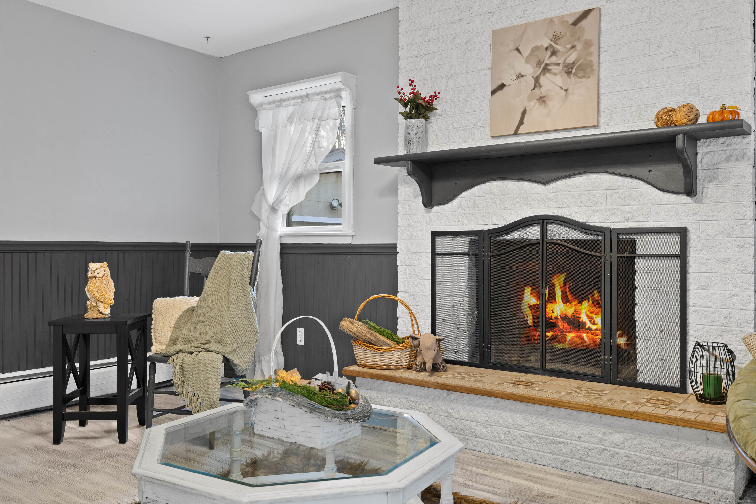 15 Egypt Lane Clinton, CT 06413 - Photo 16 of 40 a room with furniture and a fireplace