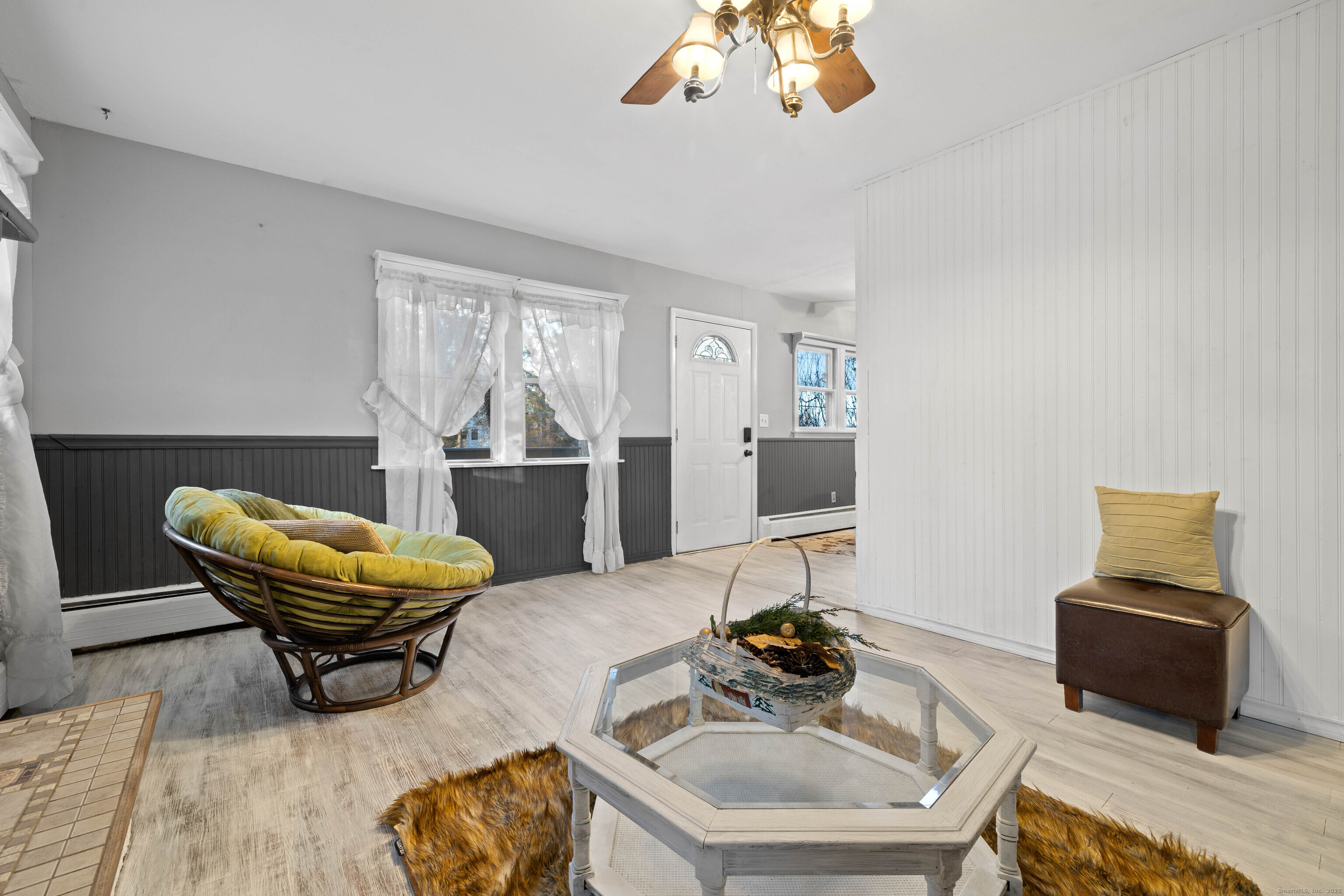 15 Egypt Lane Clinton, CT 06413 - Photo 17 of 40 a living room with a couch and a table