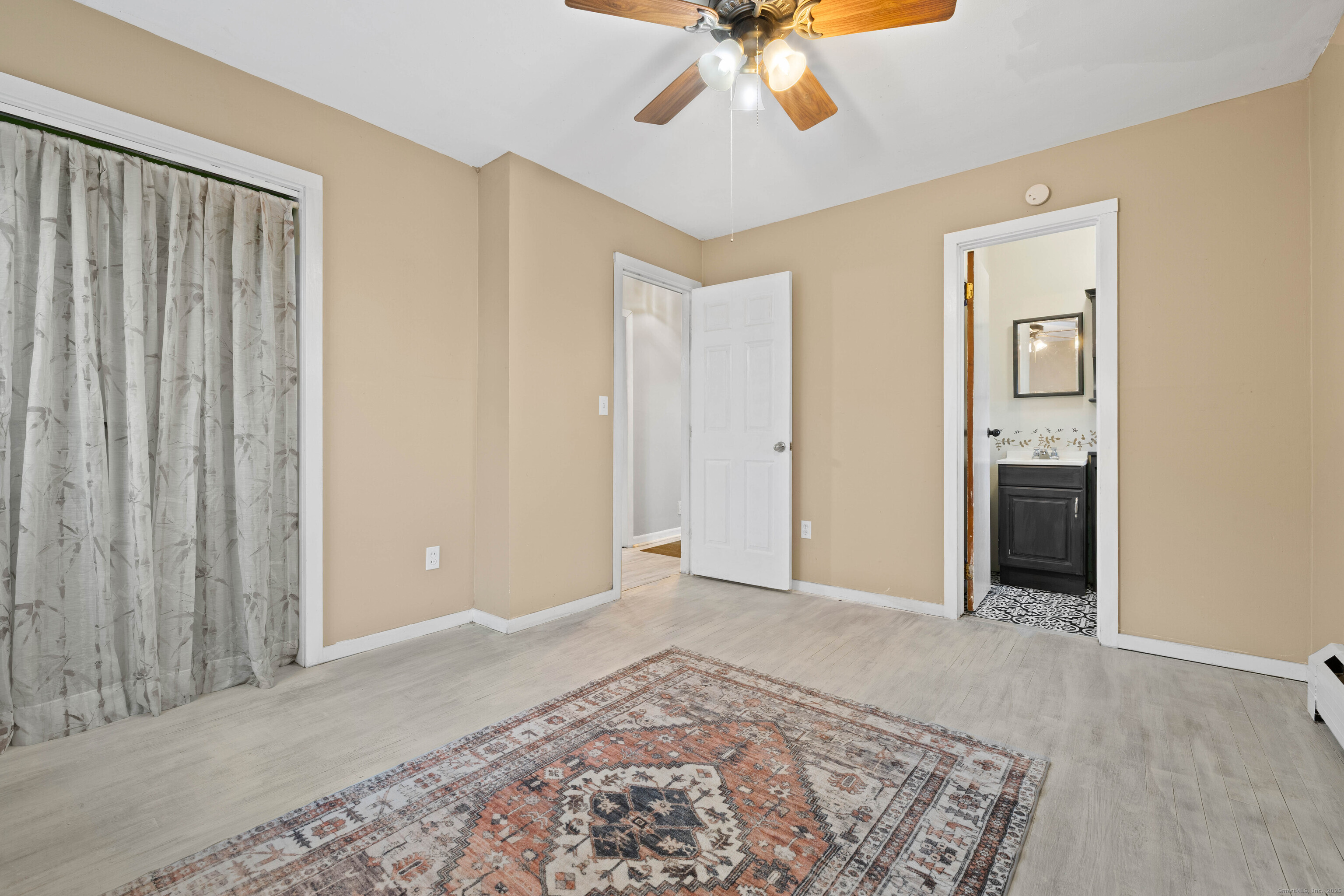 15 Egypt Lane Clinton, CT 06413 - Photo 19 of 40 a view of a room with a flat screen tv