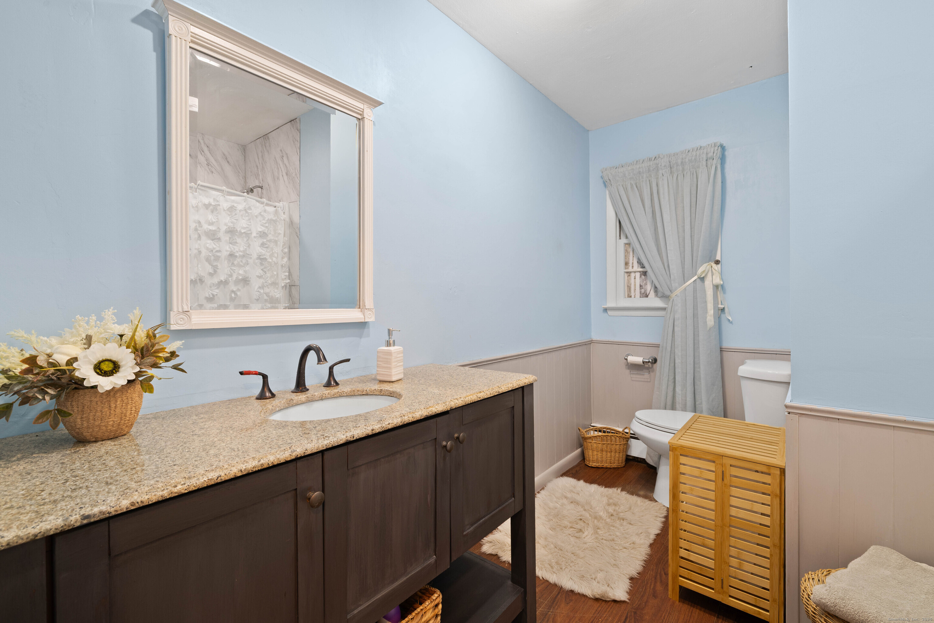 15 Egypt Lane Clinton, CT 06413 - Photo 21 of 40 a bathroom with a sink mirror and toilet