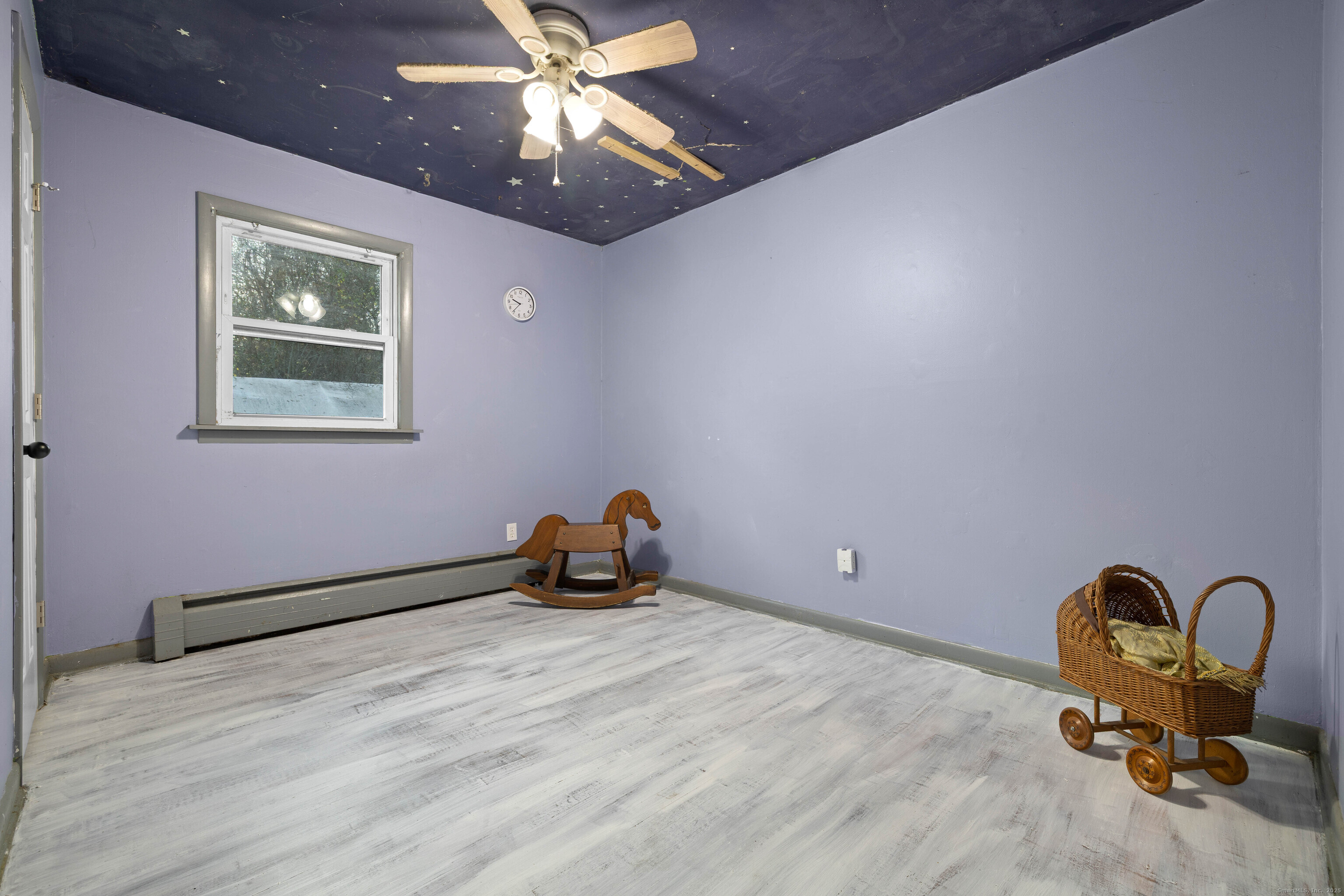 15 Egypt Lane Clinton, CT 06413 - Photo 22 of 40 a room with gym equipment and a chandelier