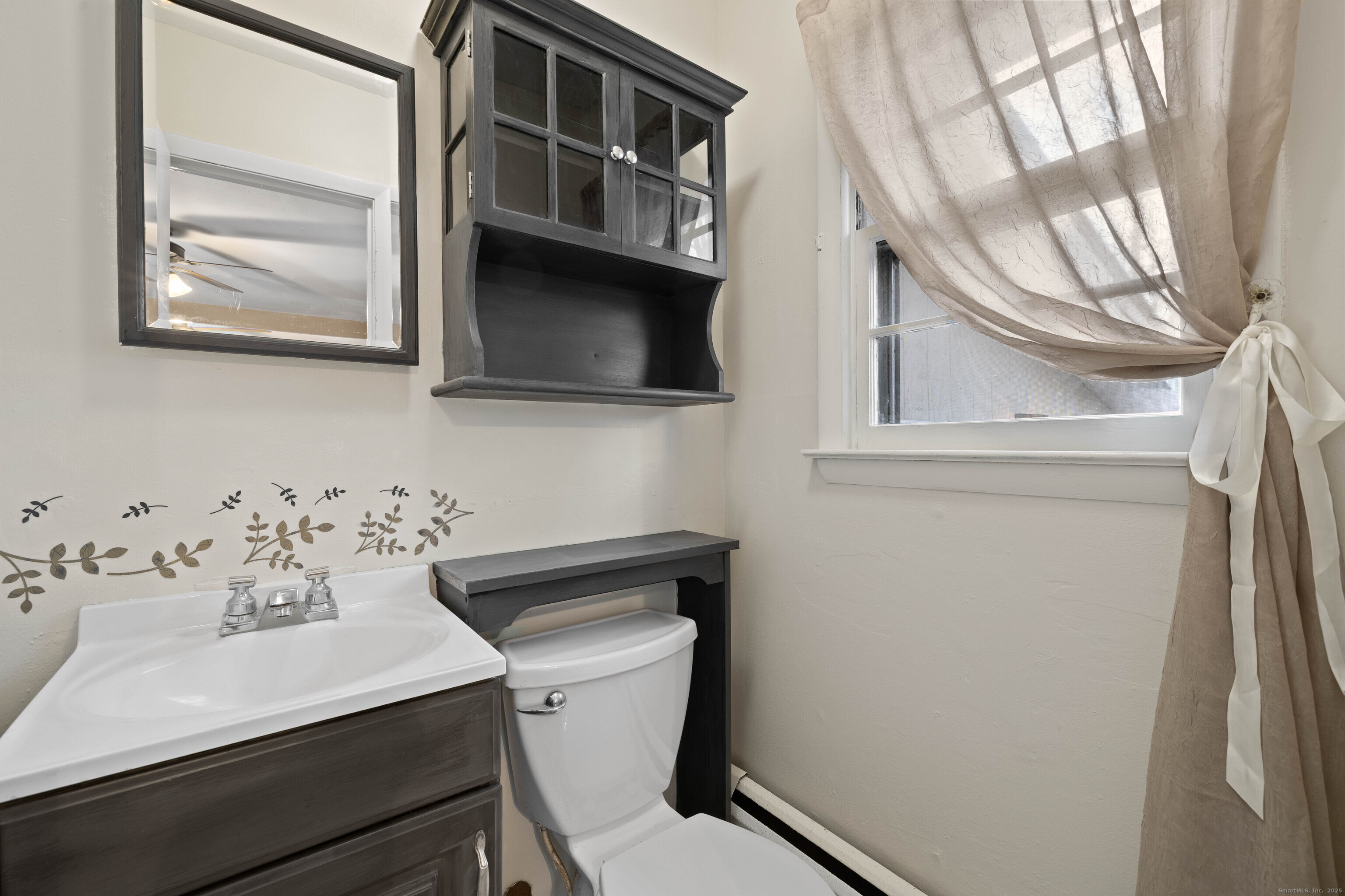 15 Egypt Lane Clinton, CT 06413 - Photo 26 of 40 a bathroom with a sink and a toilet