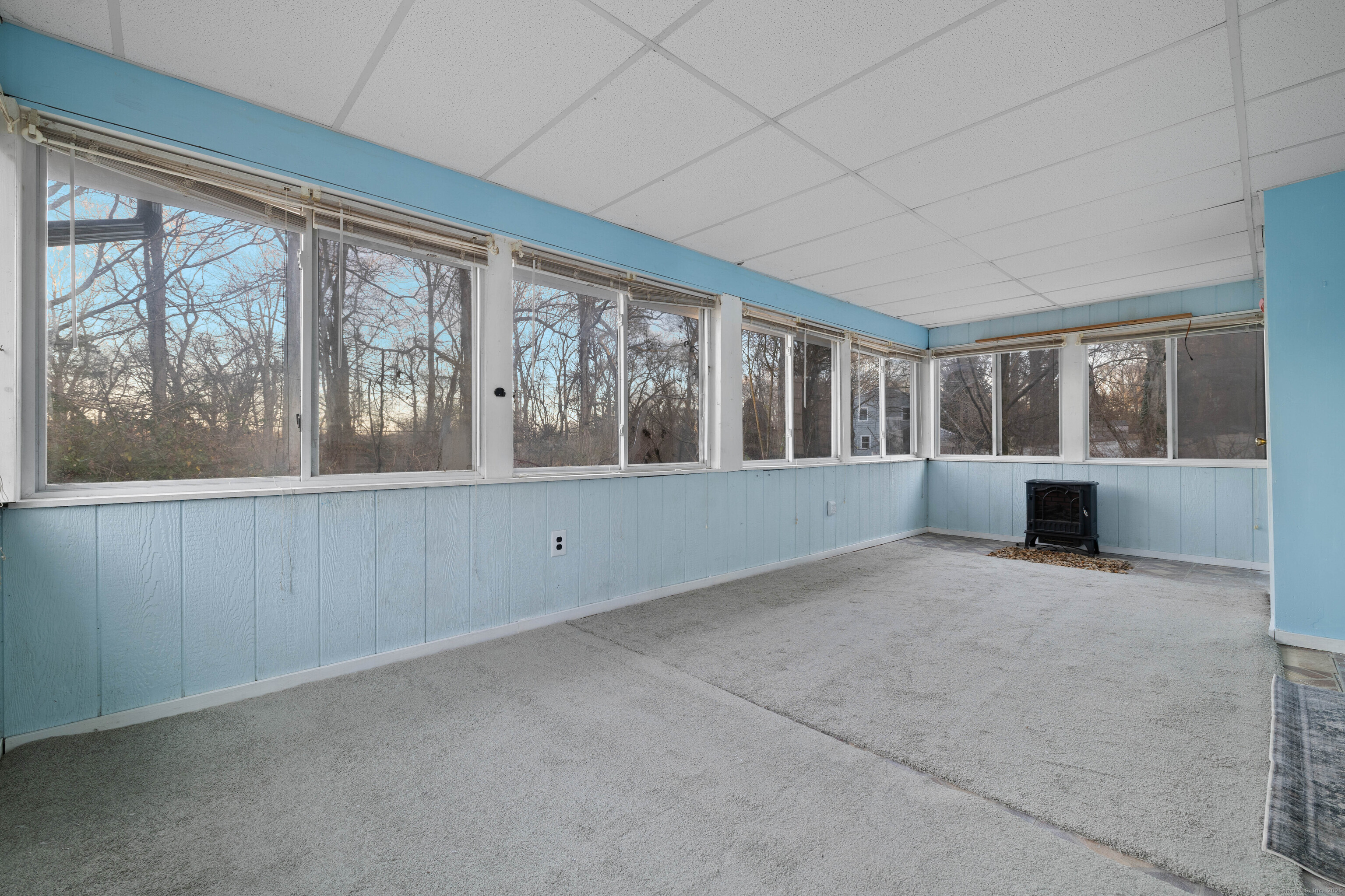15 Egypt Lane Clinton, CT 06413 - Photo 29 of 40 an empty room with windows