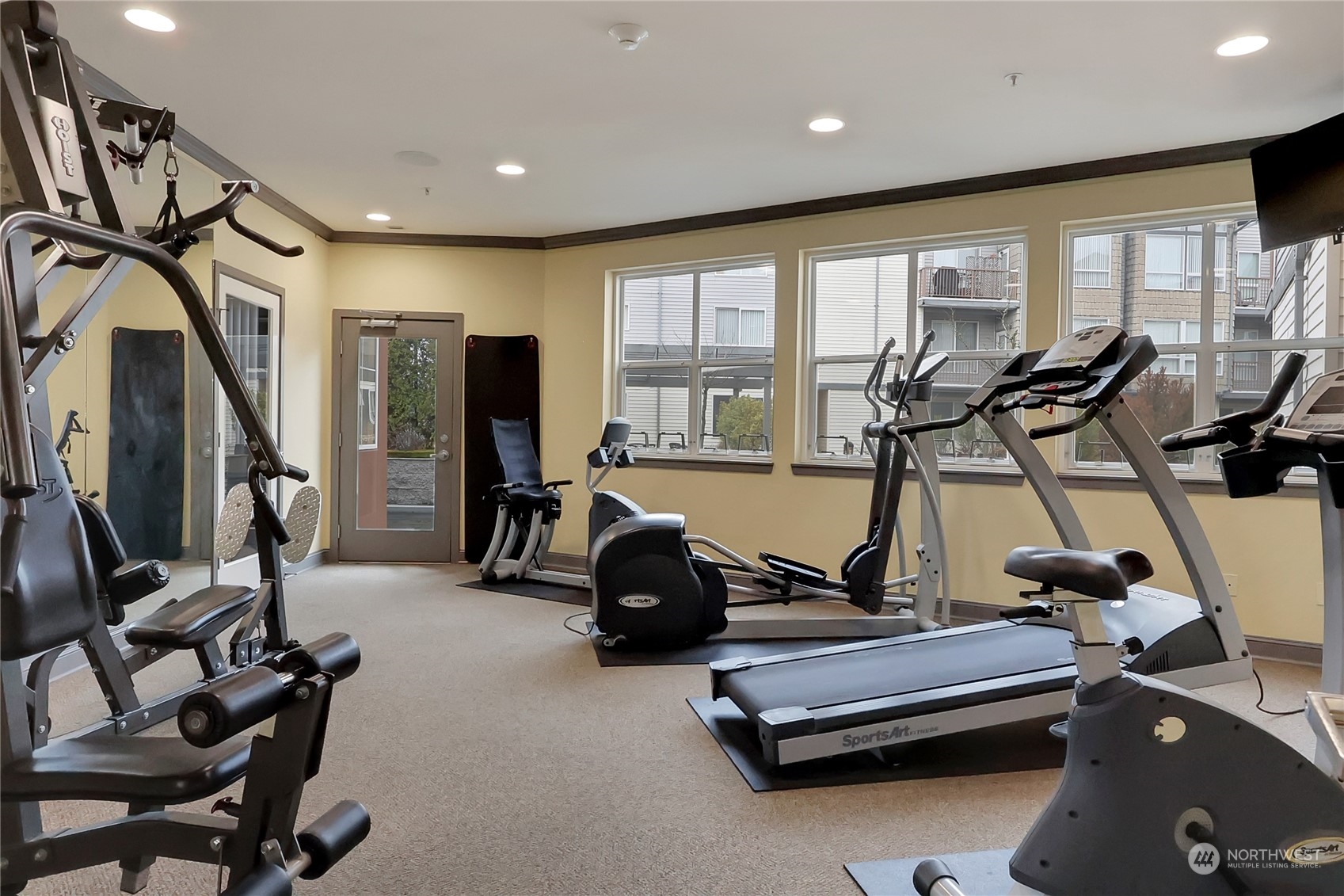 225 Logan Avenue South, Unit 307 Renton, WA 98057 - Photo 10 of 23 a view of a room with gym equipment