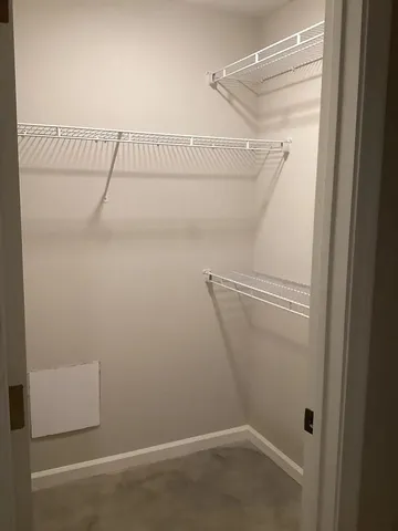 a view of a room with racks on the wall