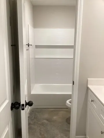 a bathroom with a bathtub