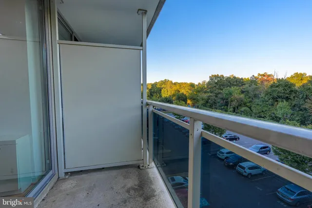 a view of a balcony with an outdoor space