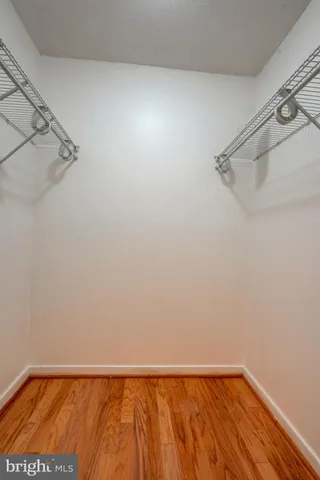 a view of a room with racks on the wall