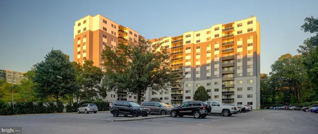 a view of car parked on the roadside