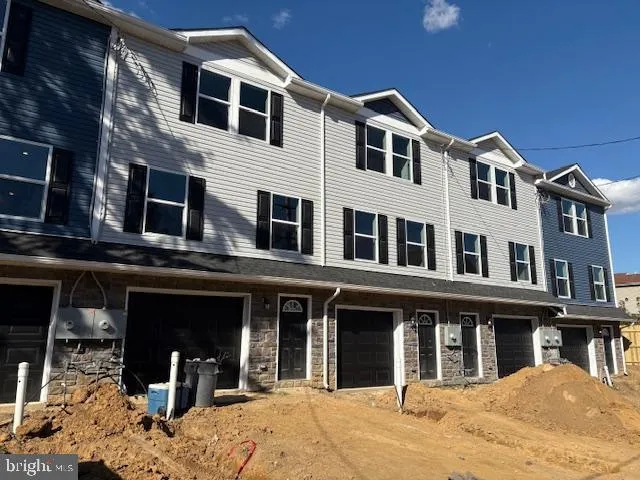 a front view of a building with street