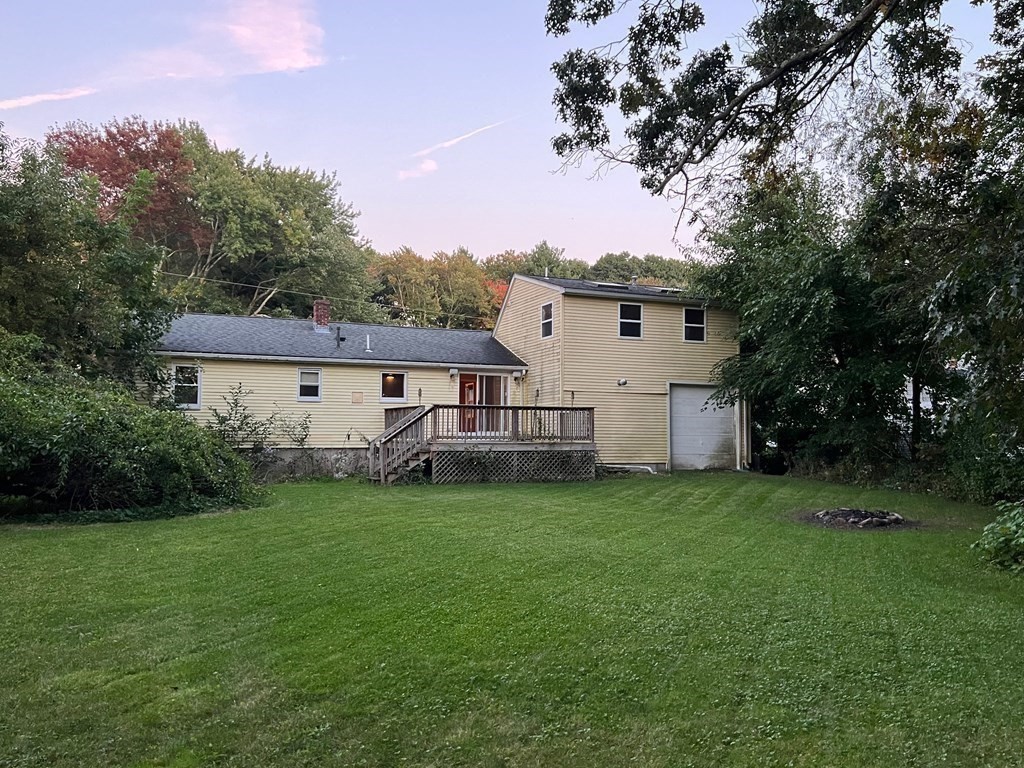 11 Lindsay Road Billerica, MA 01821 - Photo 14 of 17 a view of a house with a big yard potted plants and large tree