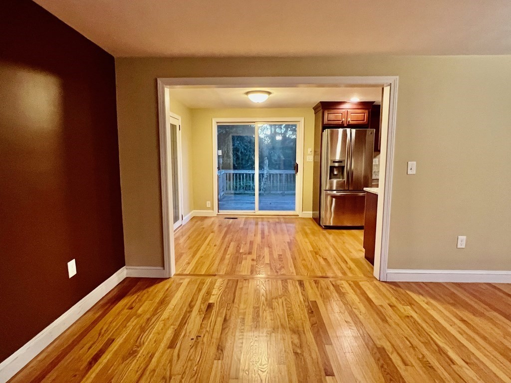 11 Lindsay Road Billerica, MA 01821 - Photo 3 of 17 a view of a room with wooden floor and door