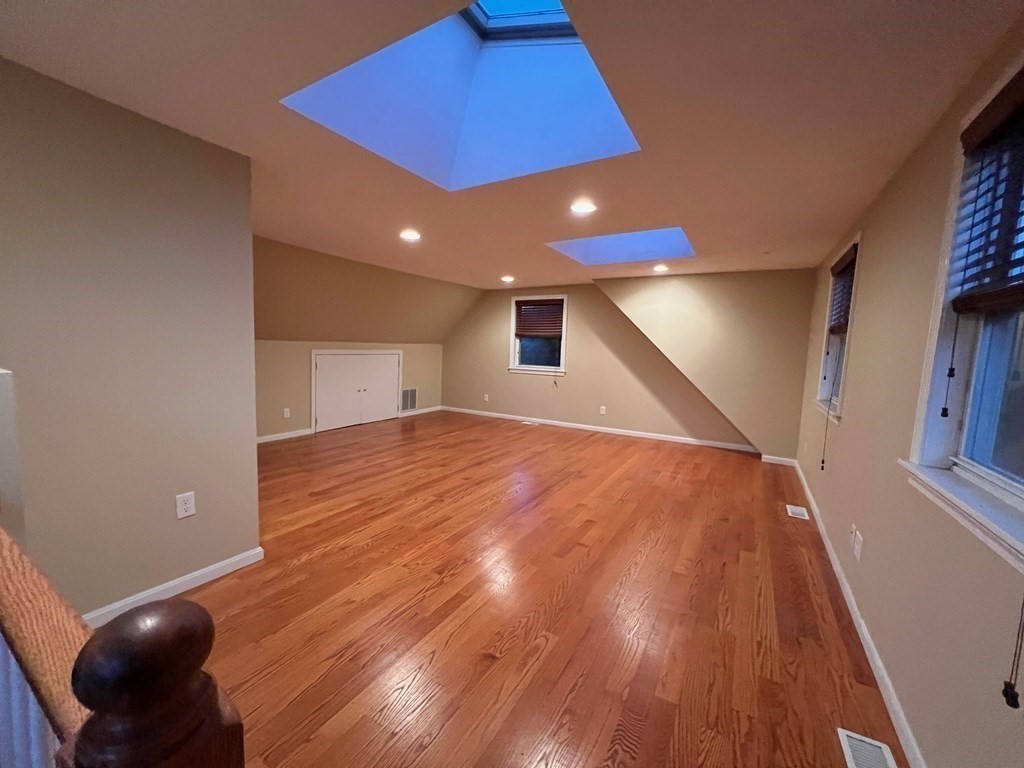 11 Lindsay Road Billerica, MA 01821 - Photo 9 of 17 a view of an empty room and wooden floor