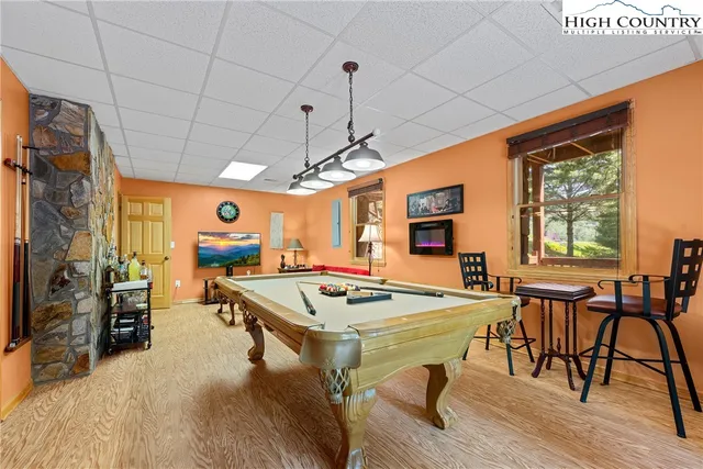 a view of a hallway with large windows