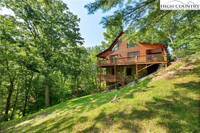 a view of a balcony with wooden floor